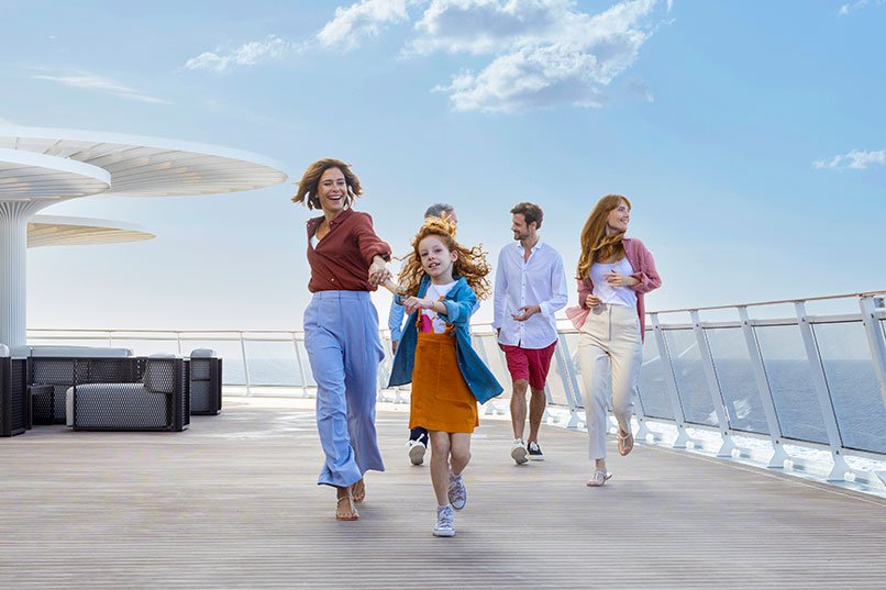 A family enjoying a sunny day on the deck of a cruise ship | MSC Cruises A family enjoying a sunny day on the deck of a cruise ship | MSC Cruises