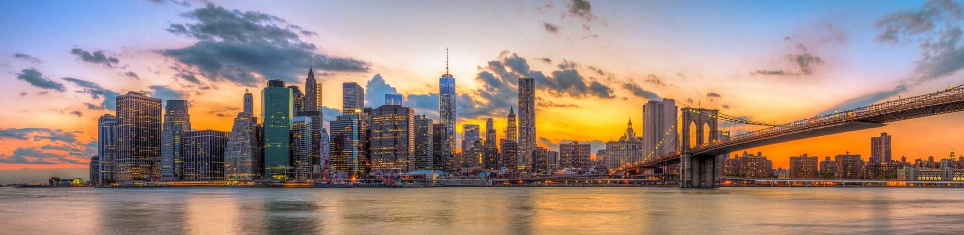 New York City skyline and Brooklyn Bridge at sunset | MSC Cruises New York City skyline and Brooklyn Bridge at sunset | MSC Cruises